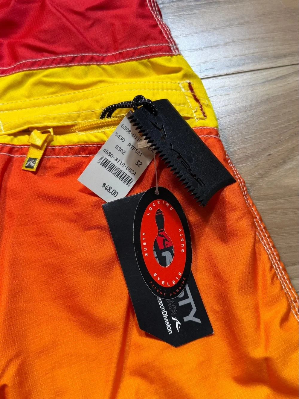 Brand new with tags Rusty Men’s Gradient Red-Orange-Yellow Swim Trunks